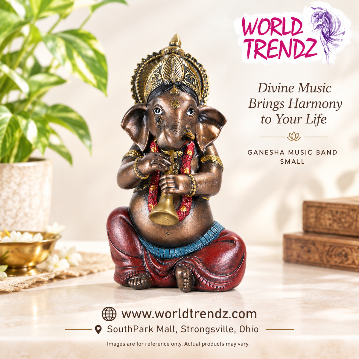A small Ganesha figurine playing a brass flute, shown on a tabletop with decorative props and overlaid promotional text for World Trendz.