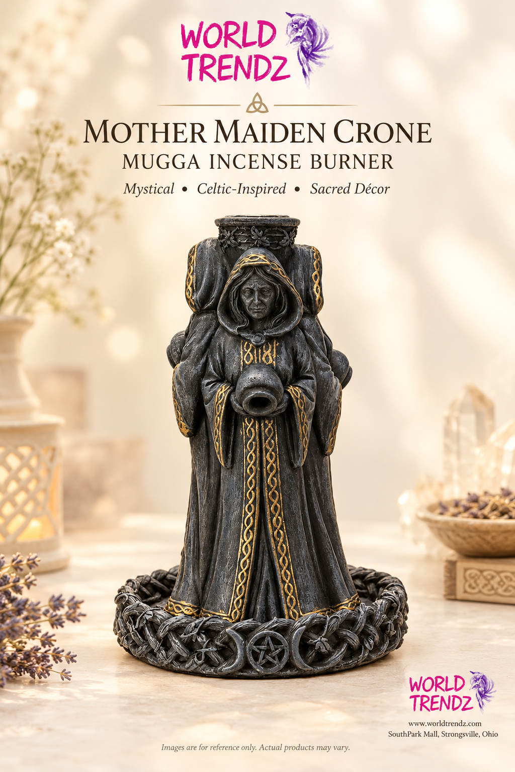 Mother Maiden Crone Mugga Incense Burner figurine by World Trendz, featuring a dark gray hooded figure with gold Celtic-style patterns, set against a warm, softly blurred background with decorative dried flowers and crystals.