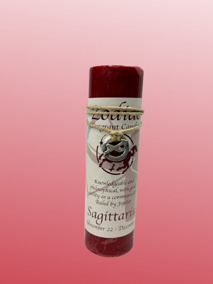 Candle with a label on a pink background