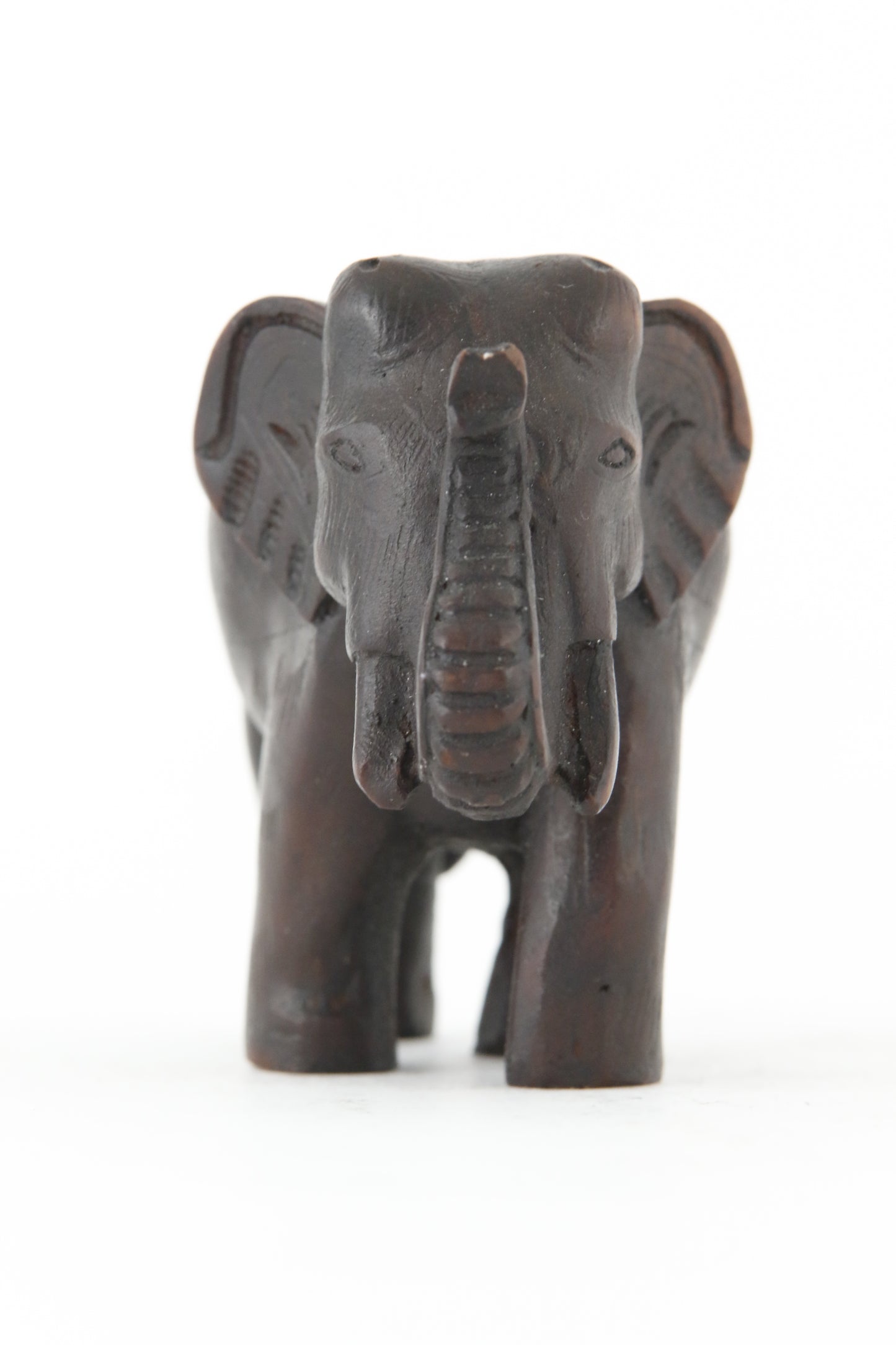 ELEPHANT WALKING STATUE DARK FRONT VIEW