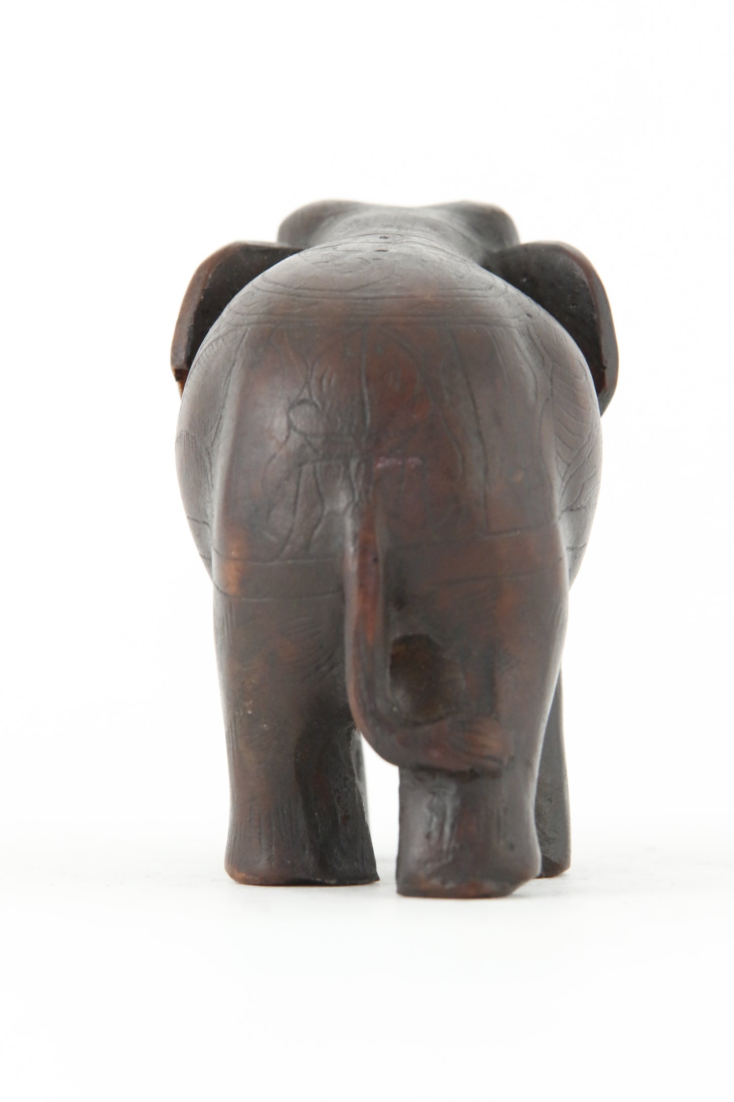 ELEPHANT WALKING STATUE DARK BACK VIEW