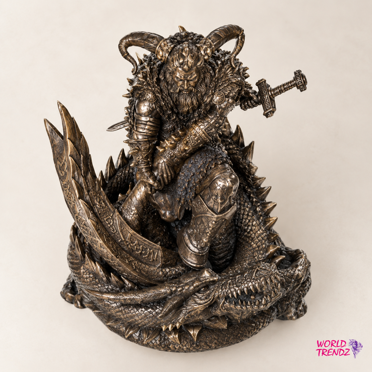 A detailed fantasy figurine of Thor, a horned warrior riding a dragon, crafted in a dark metallic pewter finish, set against a plain light beige background.