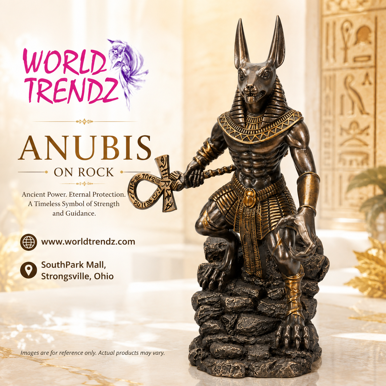 An Egyptian Anubis statue depicted as a muscular jackalope holding an ankh, standing on a rocky base. The product is shown alongside promotional text for 'World Trendz' on a warm beige background with hieroglyphic details.