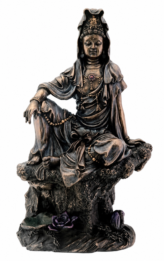 Bronze statue of Guanyin a seated figure on a white background