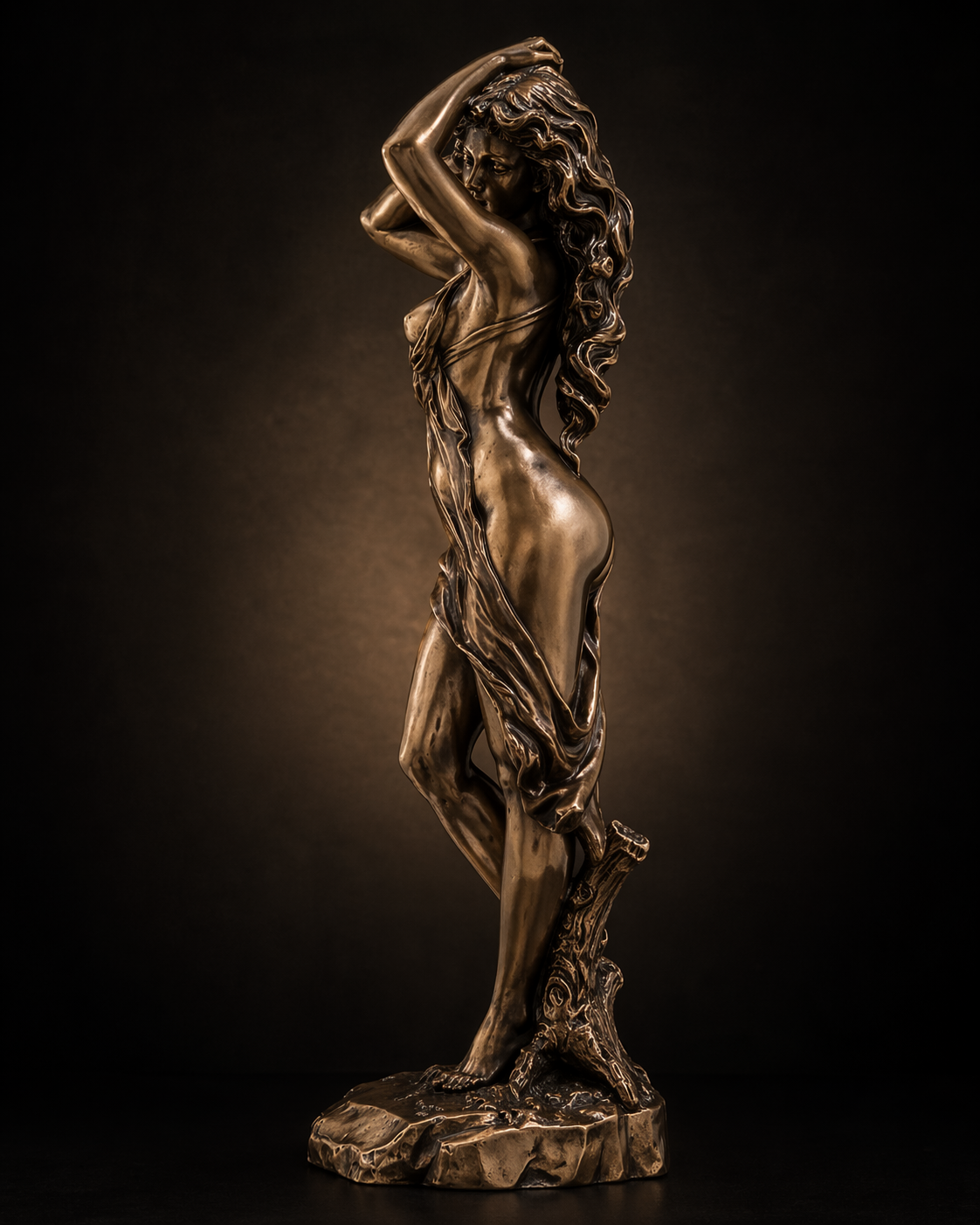 Bronze statue of Aphrodite against a dark background