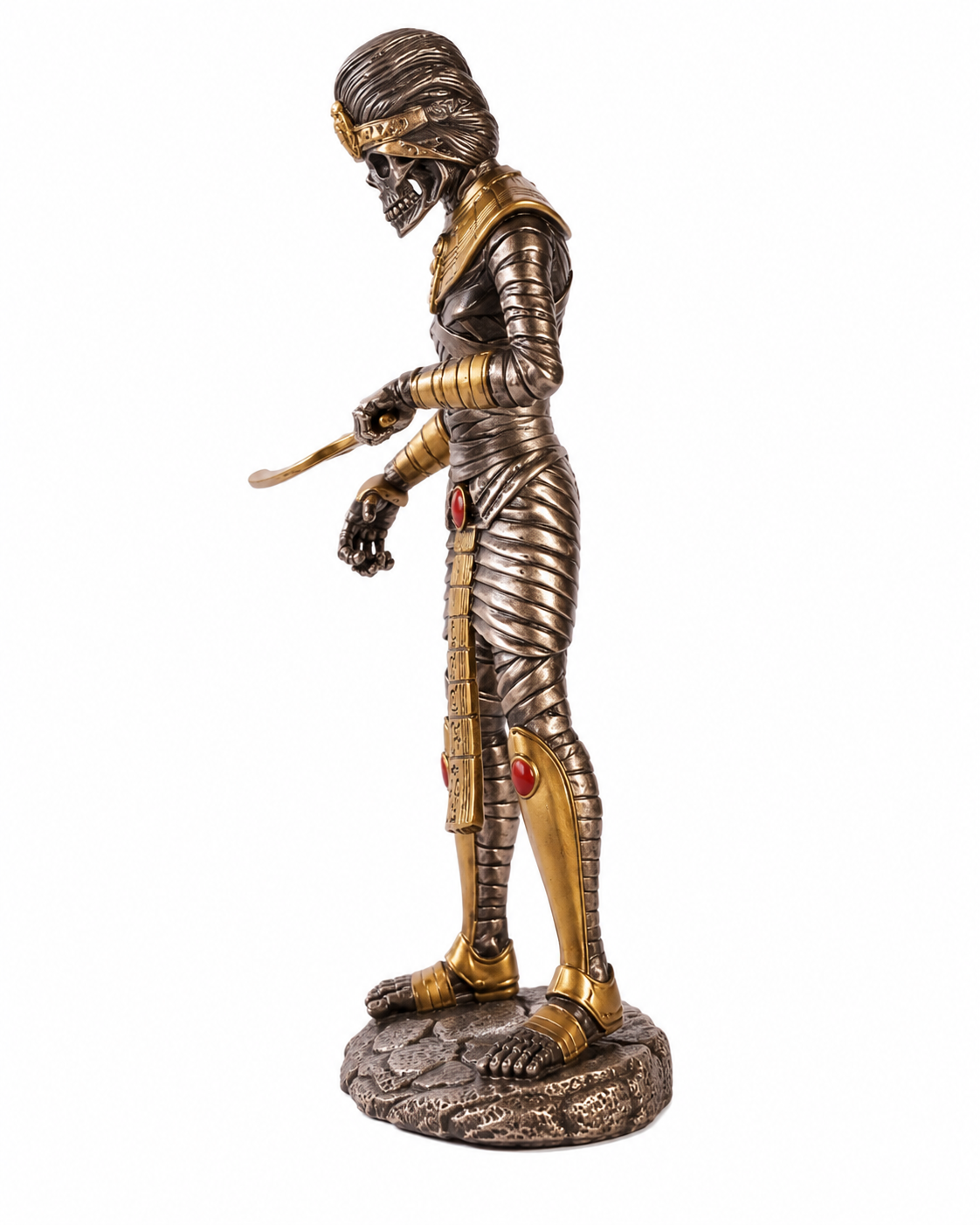 Statue of an Egyptian Mummy in armor with a sword on a white background
