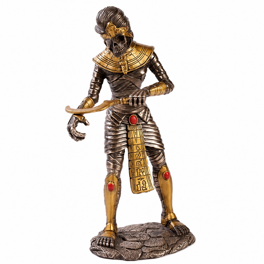 Statue of an Egyptian Mummy in gold and bronze armor on a white background