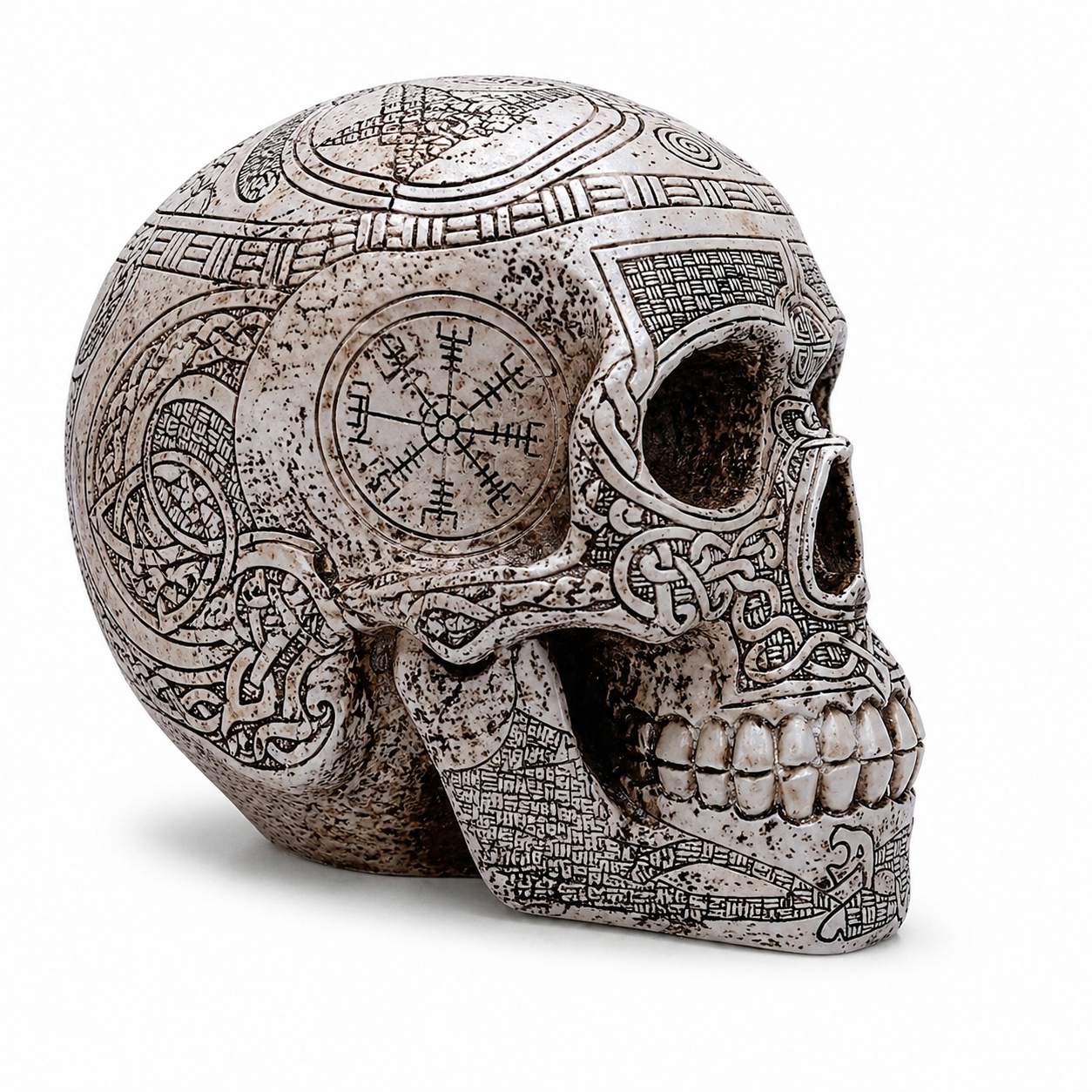 Decorative Viking skull with intricate patterns on a white background