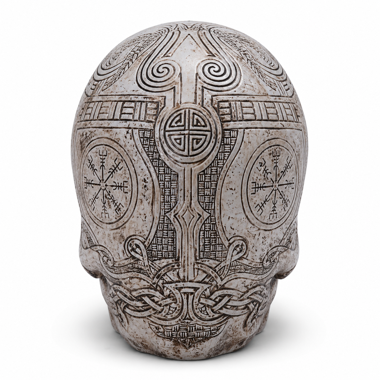 Decorative Viking skull with intricate carvings on a white background
