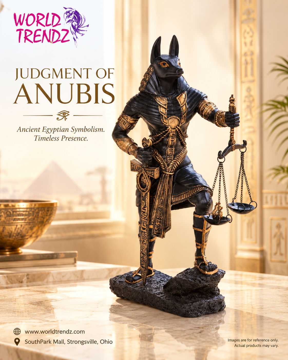 Judgement of Anubis statue in black and gold, holding a scale of justice, displayed on a marble surface in a warm, Egyptian-themed interior setting. The image features promotional text for 'World Trendz' and a location in South Park Mall.