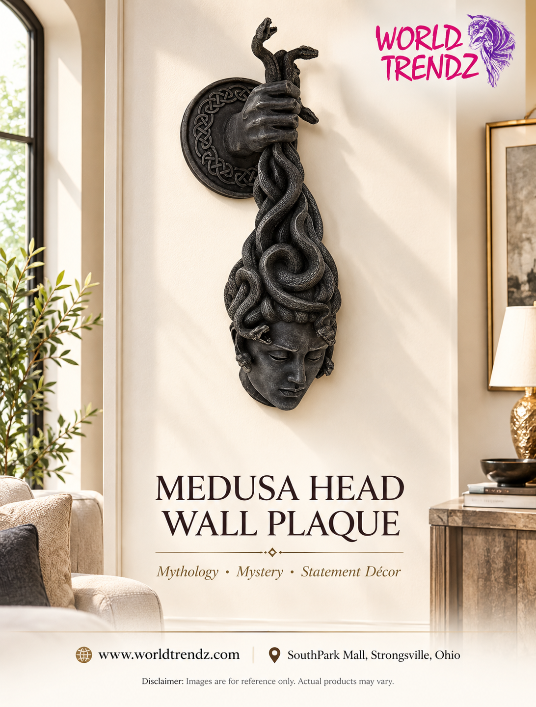 A black metal Medusa Head Wall Plaque, mounted on a cream wall in a styled interior. The plaque is the product being sold, with surrounding furniture and decor acting as lifestyle context.