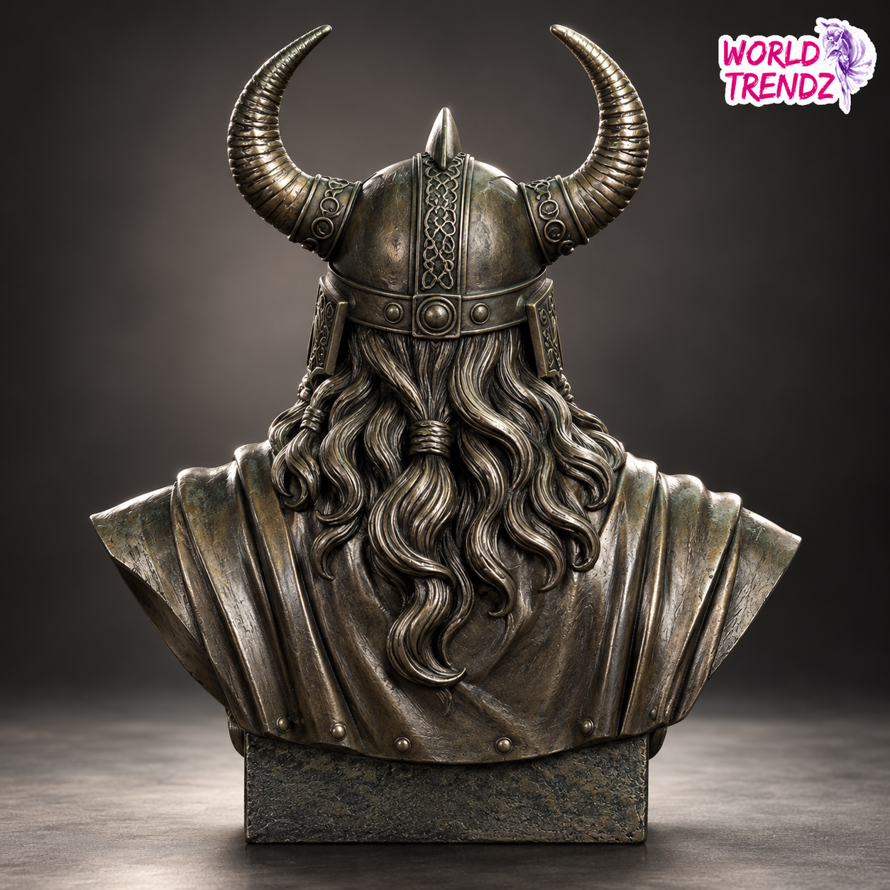 A detailed bronze-finished bust sculpture of Odin Cold Cast Bronze Statue, viewed from the back, featuring a horned helmet, long wavy hair, and draped shoulders on a stone-like base. The 'World Trendz' logo is visible in the top right corner.