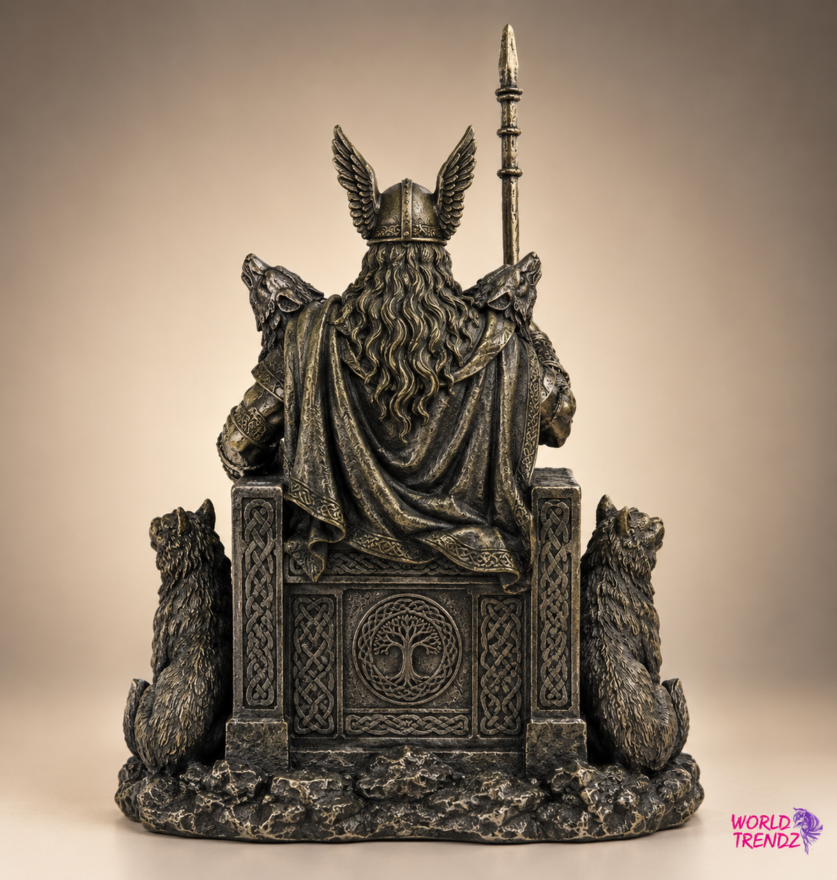 A dark metallic ODIN — Norse God viewed from behind, wearing a winged helmet and holding a spear, with wolves on both sides and a tree of life emblem on the backrest, photographed against a warm beige gradient background.