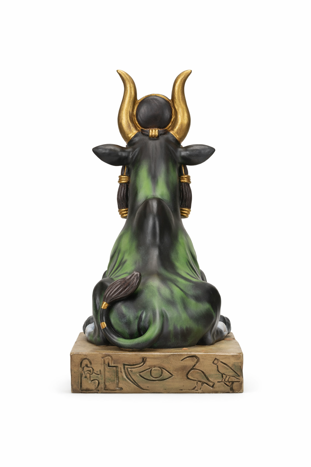 Statue of a bull with gold horns on a white background