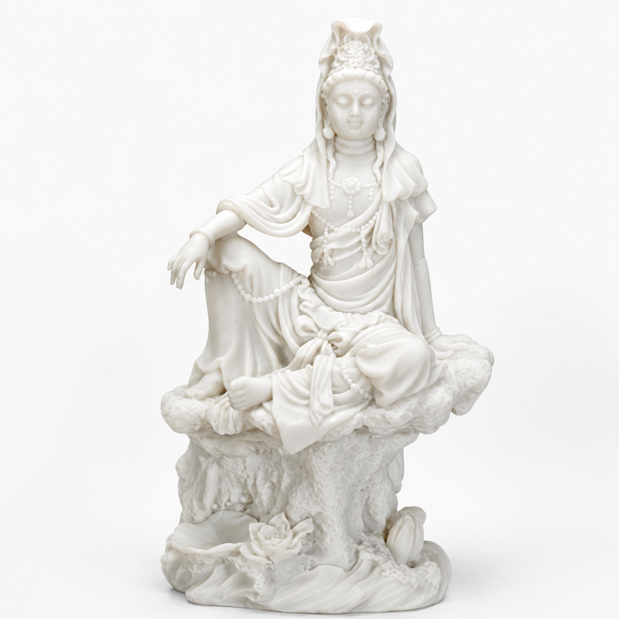 White marble statue of a Kuan Yin on a white background