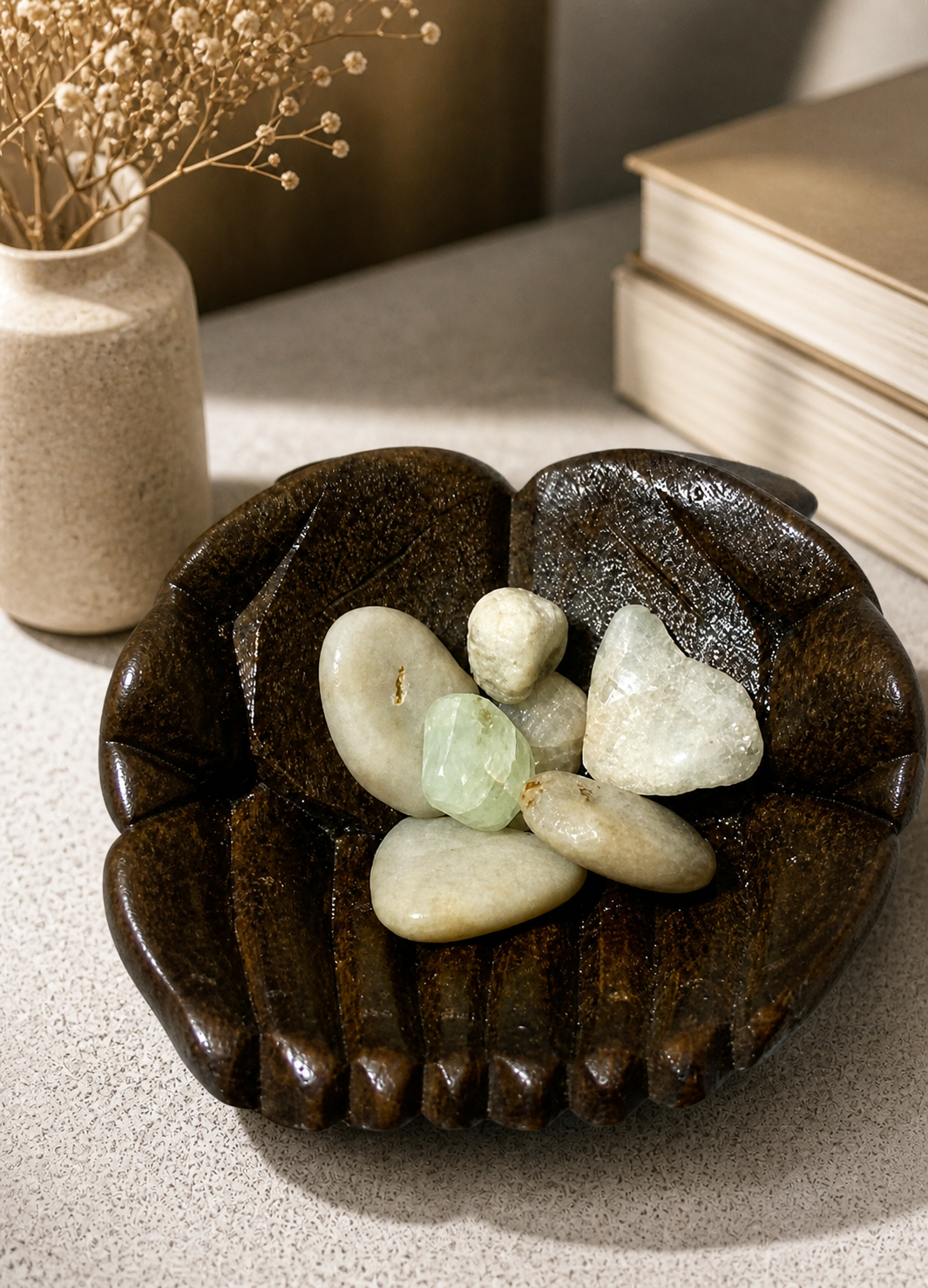 A minimalist interior décor scene featuring aquamarine stones displayed in a carved wooden dish on a neutral background. Soft lighting creates a warm, aesthetic ambiance, suggesting use as a decorative tabletop element. Preserve exact placement and composition while enhancing visual appeal.