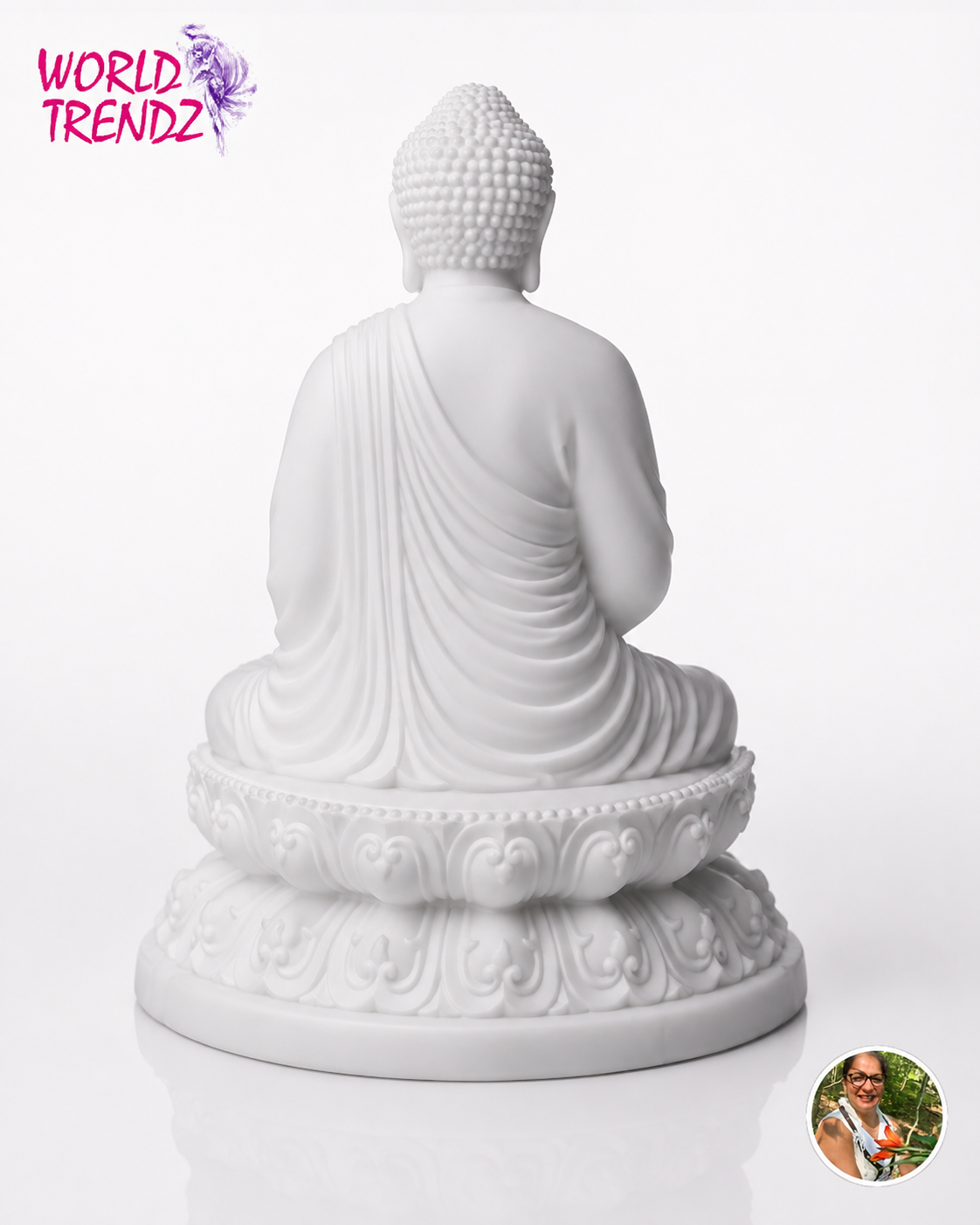 A white seated Buddha statue shown from the back, featuring detailed draped robes and an ornate lotus-style base, photographed on a clean white background.